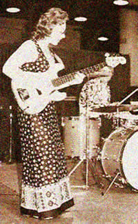 Carol on guitar
